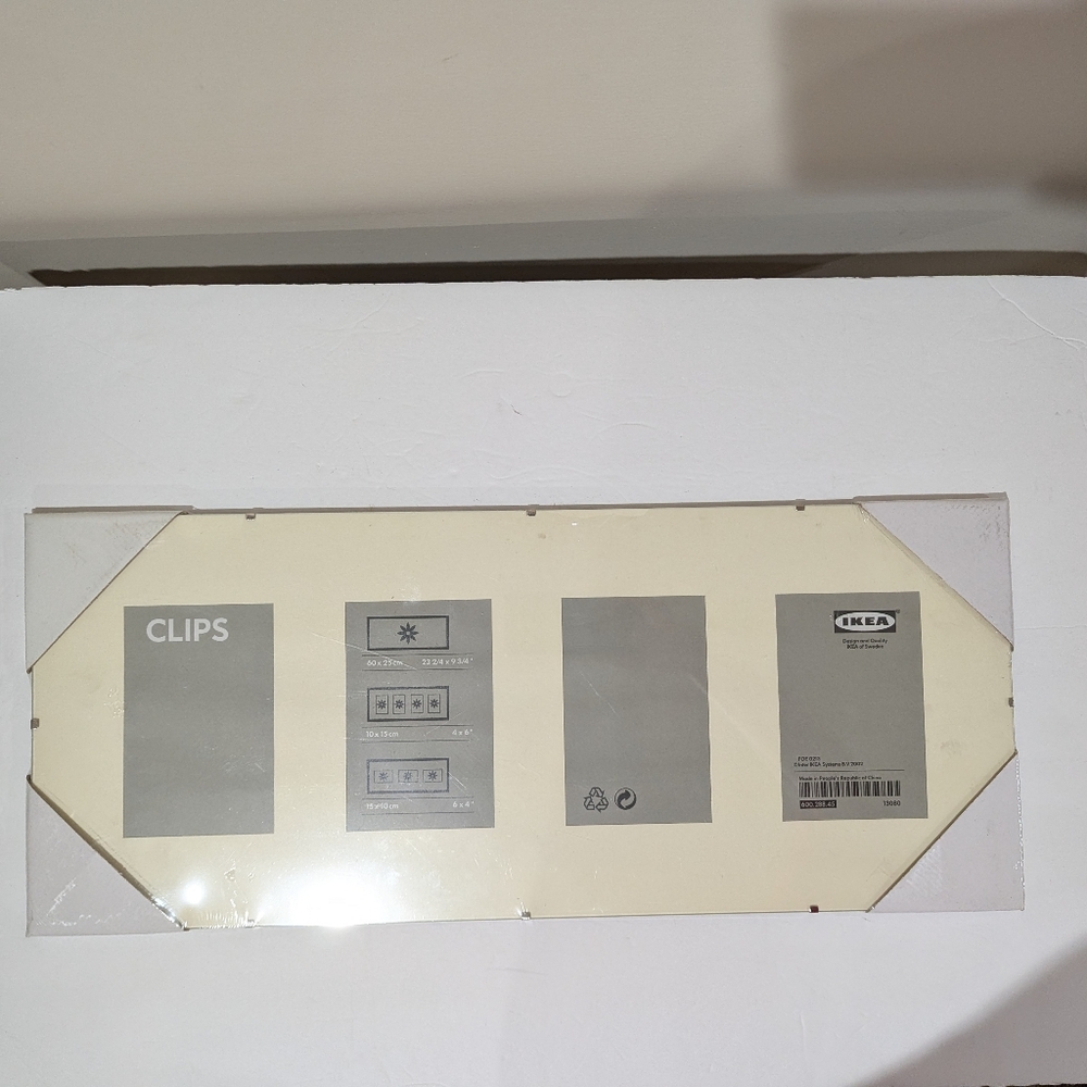 NEW Modern IKEA Clips Frame. 10" X 23" Approx. 4 Pictures